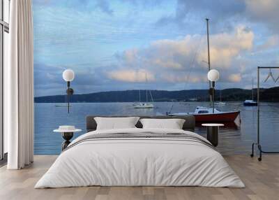 landscape of the lake of bracciano, boats still, reflections of   the clouds on the aquatic surface Wall mural