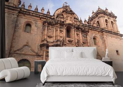 Tourist taking a picture in the main square of Cuzco. Wall mural