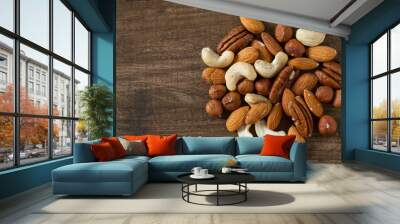 mixed nuts on wooden surface Wall mural