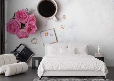 Coffee, roses, retro camera and gold stationery on the marble background Wall mural