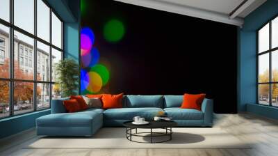 Christmas lights on black background, abstract for text, advert Wall mural