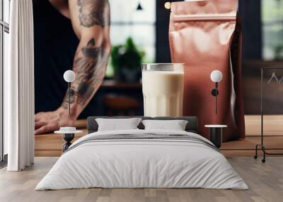 man with protein shake on table Wall mural