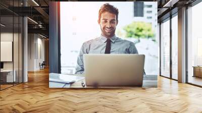 Business man, happiness and laptop writing of a insurance agent in a office online. Agency work, male employee and worker working and planning on a computer with internet and job email at desk Wall mural