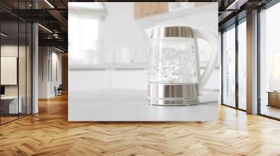 Modern glass electric kettle boiling on kitchen table Wall mural