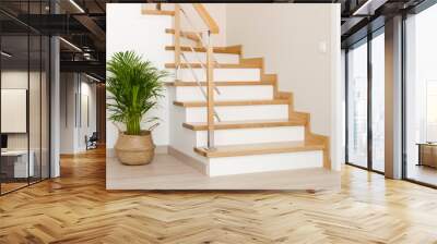 Modern natural ash tree wooden stairs in new house interior Wall mural