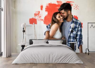 Lovely happy young couple renovation new home Wall mural