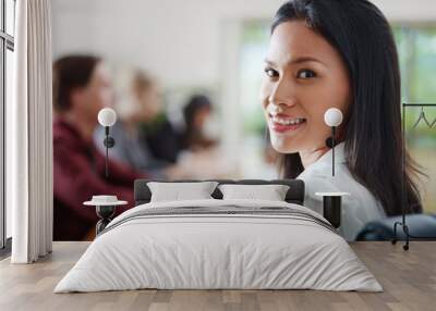 businesspeople talking in meeting room and woman smiling Wall mural