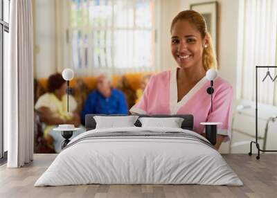 happy and confident woman at work as nurse in hospital Wall mural