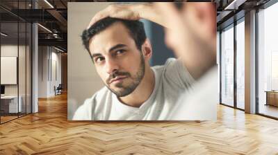 Man Worried For Alopecia Checking Hair For Loss Wall mural