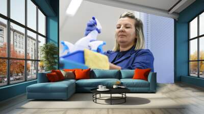 woman working as professional cleaner in office Wall mural