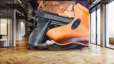 Closeup of the handgun in the holster Wall mural