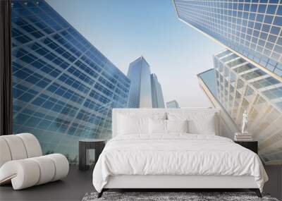 3d rendering of modern building or skyscraper and blue sky in city or downtown. That is real estate, property, house or residential. Concept for corporate, business center, finance and background. Wall mural