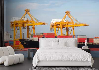 gantry crane loading and unloading cargo container from cargo ship at port to show global internatio Wall mural