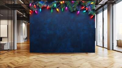 A beautifully decorated Christmas tree adorned with colorful lights and ornaments in a cozy living room. Wall mural