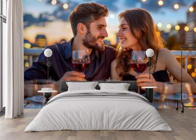 A couple enjoying a romantic dinner with wine, exchanging loving glances. Perfect for advertising romantic dinners and intimate moments. Wall mural