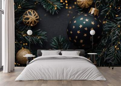 Dark elegant Christmas ornaments with gold accents resting on pine branches, set against a dark backdrop with glowing bokeh lights. Wall mural