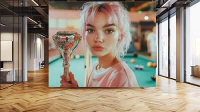 Young individual with pink hair standing near pool table and holding trophy while kissing it. Person is standing near pool table and holding cue stick, looking at, Generative AI Wall mural