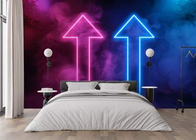 two neon arrows, one pink and one blue, pointing upwards against a dark, smoky background. The vibrant colors and upward direction create a dynamic and visually striking effect Wall mural