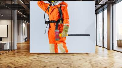 With the iron axe in their grasp the firefighter exudes a sense of preparedness and strength ready to tackle any obstacle that comes their way. Wall mural