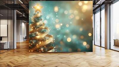 A golden ribbon adorned Christmas tree with twinkling lights and a glittering star on top, set against a soft, bokeh background. Wall mural