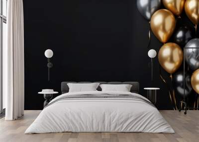 Elegant gold and black balloons arranged on a dark background Wall mural