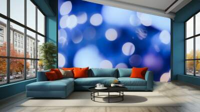 Nature light background- bokeh christmas. Illuminated decor Wall mural