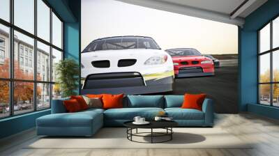 Front view of auto racing race cars racing on a track with motion blur.  Wall mural