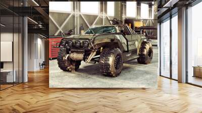 Weaponized off road 4x4 combat vehicle stored inside an industrial hangar. 3d rendering  Wall mural