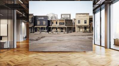 Wide side view of a rustic antique Western town with various businesses. 3d rendering Wall mural