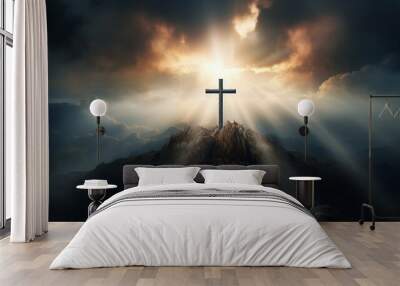 Cross on the top of the mountain with rays of light in the sky Wall mural