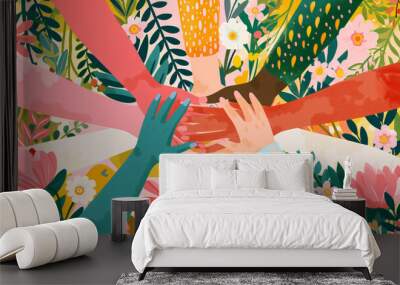 A diverse group of hands reaching together in unity with flowers and leaves in the background Wall mural