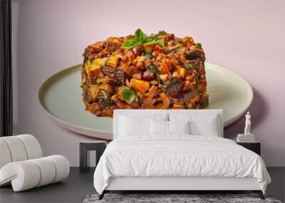 A plate of savory rice dish with vegetables and meat Wall mural