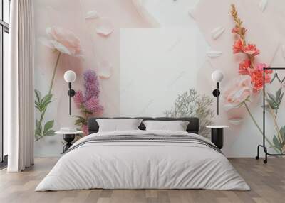 Blank White Card Surrounded by Delicate Flowers on a Pink Marble Background Wall mural