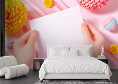 Hands Holding Blank White Card with Colorful Decorations Wall mural