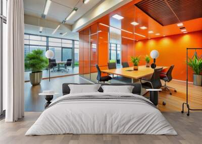 Modern office building interior features a vibrant orange accent wall with sleek lines, minimalist decor, and plenty of natural light, conveying confidence and success. Wall mural