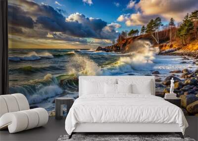 Prickly winter landscape featuring serene water flow, juxtaposed with tumultuous ocean waves crashing on a rocky, pebbled beach shoreline. Wall mural