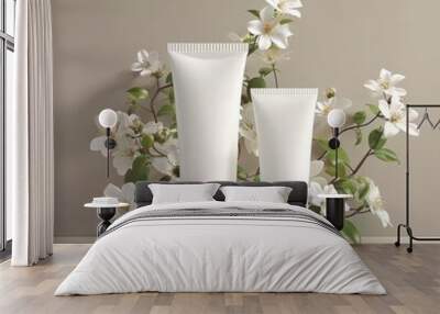 Two White Cosmetic Tubes Surrounded by White Blossoms Wall mural