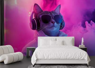 A stylish cat dressed in a white jacket, wearing sunglasses and headphones, poses with colorful smoke in the background, embodying coolness and confidence in a vibrant setting. Wall mural