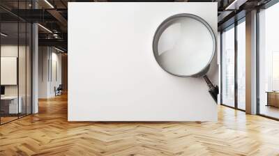 Magnifying glass searching concept on white background Wall mural