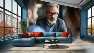 Financial Adviser Providing Investment Strategies Consultation to Couple in Profile View Wall mural