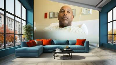 african american man in a hospital bed. Wall mural