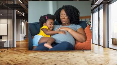 African American pregnant mother and her daughter. Wall mural