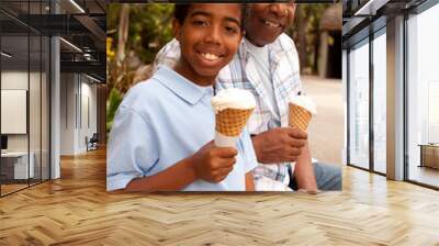 Father and son eating ice cream. Wall mural