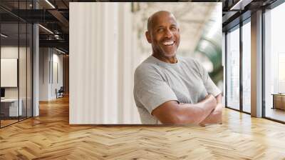 Happy mature African American man smiling outside. Wall mural