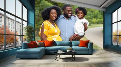 Portrait of an African American woman and her family. Wall mural