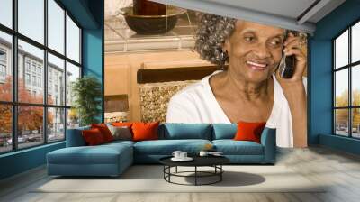 Portrait of an elderly African American woman at home. Wall mural