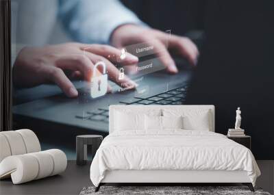 Businessman typing on keyboard laptop computer to input username and password for or technology security system and prevent hacker concept. Wall mural