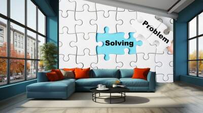 Hand holding problem wording on jigsaw and assemble to solving wording for creative thinking idea solution concept. Wall mural