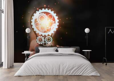 Mechanic gear inside of lightbulb with glowing for creative thinking idea and problem solving concept. Wall mural