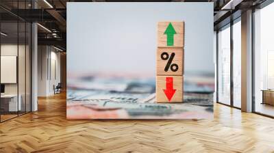 Percentage sign with up and down arrow on dollar banknote for inflation and interest rating increasing concept. Wall mural